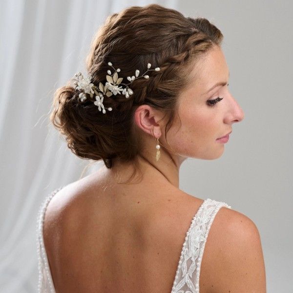 Dark Brown Braided Updo With Floral Accessory Dark Brown Braided Updo With Floral Accessory β Winter Formal Hairstyles