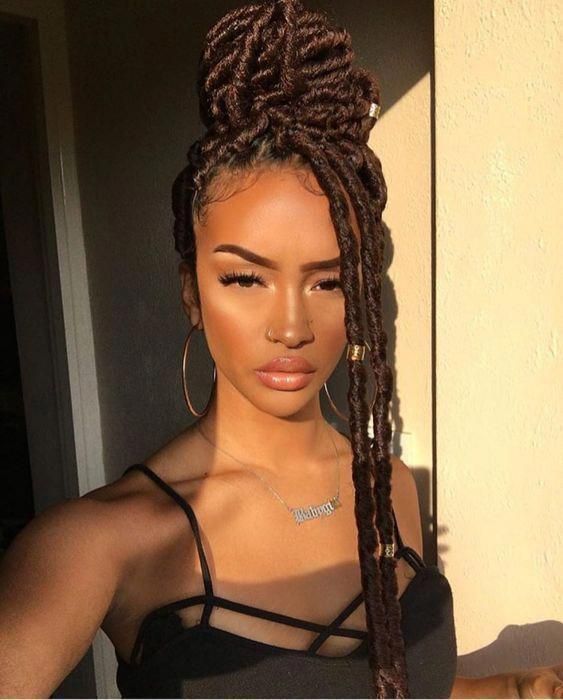 High Bun With Cascading Locs High Bun With Cascading Locs β Winter Loc Styles