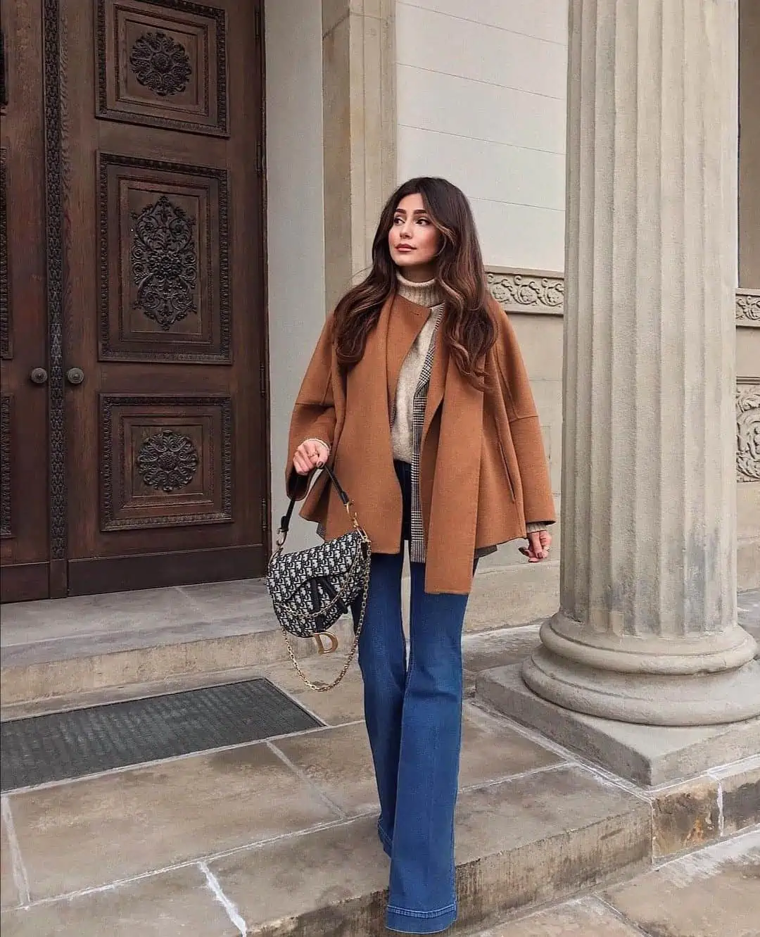 Elevated Layers: Plaid Vest and Cape Coat with Blue Wide Leg Jeans — Winter Outfits with Wide Leg Jeans