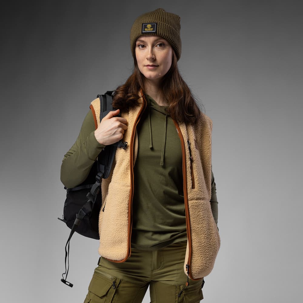 Beige Fleece Vest Over Olive Hoodie for Casual Hikes — Winter Hiking Outfits