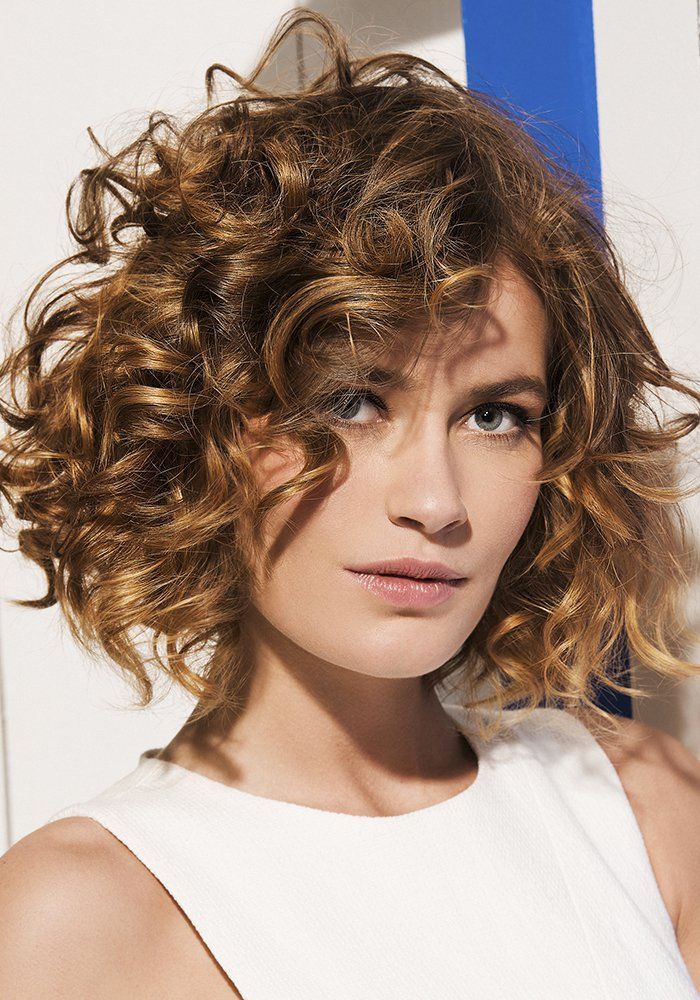Honey Blonde Shag With Curly Bangs — Winter Hairstyles for Curly Hair