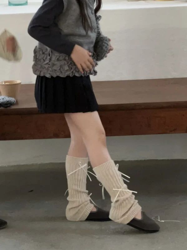 Beige Knit Leg Warmers with Ribbon Ties and Pleated Skirt — Leg Warmers Outfits