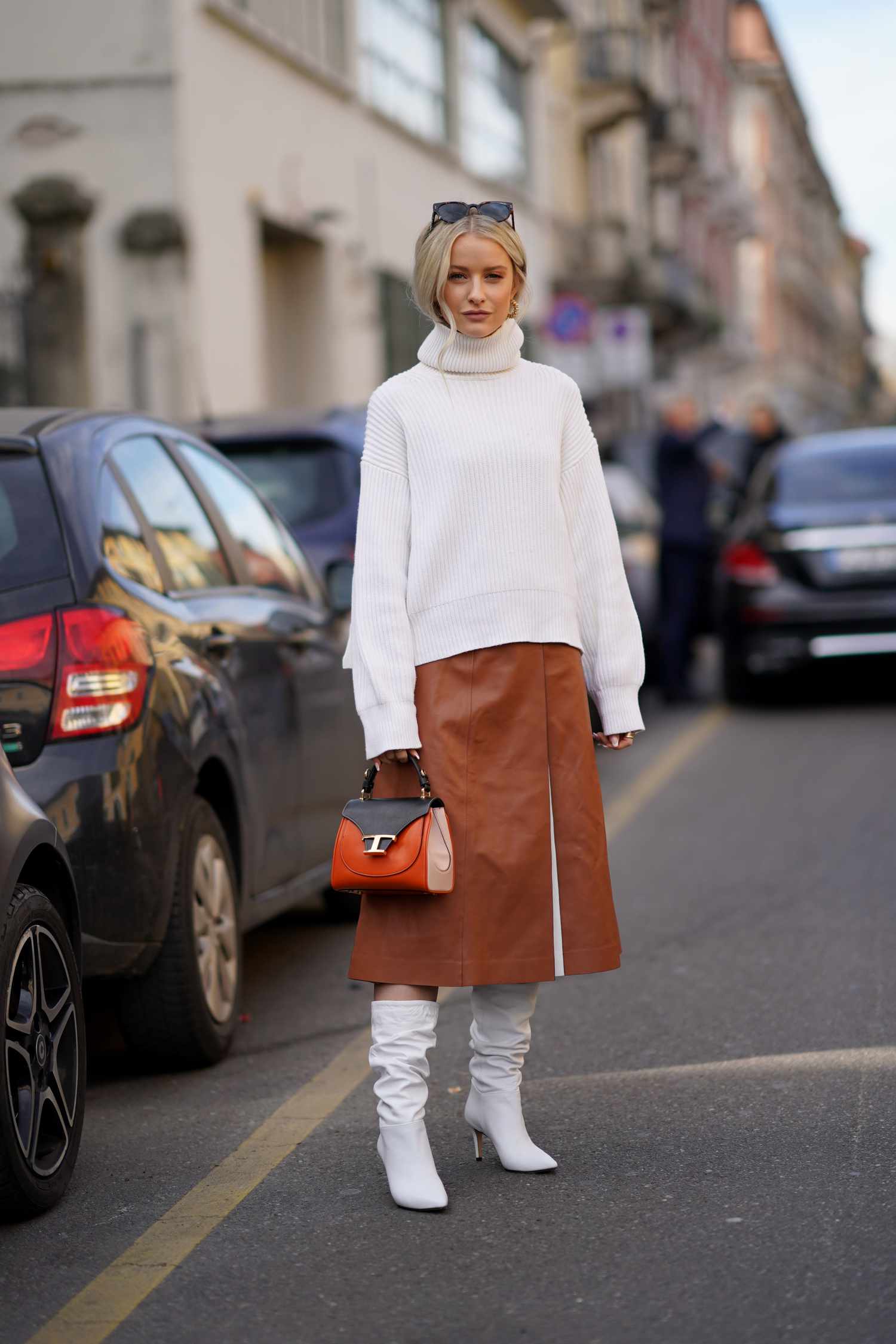 Leather Midi Skirt Paired with a Ribbed Turtleneck and Knee-High Boots — Winter Skirt Outfits