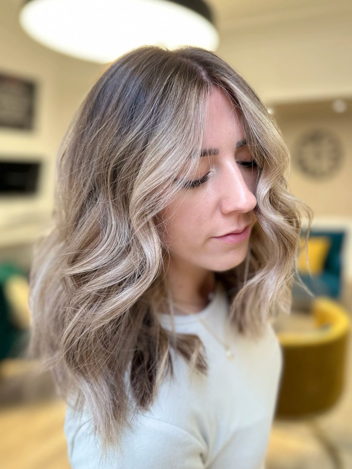 Dark Blonde With Ash Lowlights and Curtain Bangs — Lowlights for Blonde Hair