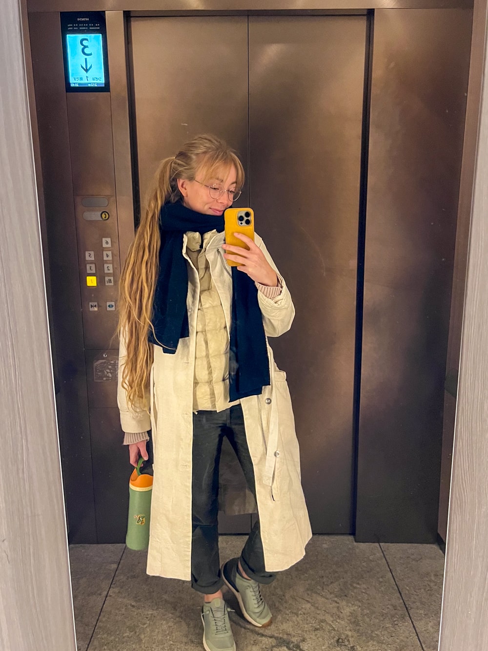 Cozy Travel Ensemble: Trench Coat, Puffer Vest, and Scarf Cozy Travel Ensemble: Trench Coat, Puffer Vest, and Scarf β Japan Winter Outfits