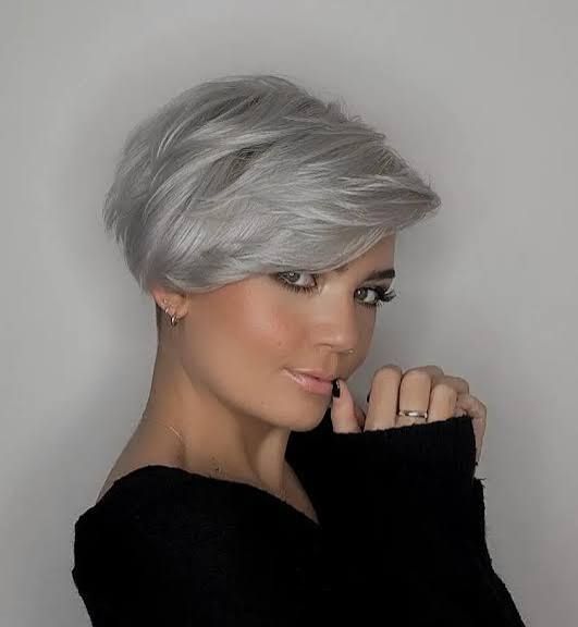 Striking Silver Pixie with Layered Bangs — Winter Hairstyles for Short Hair