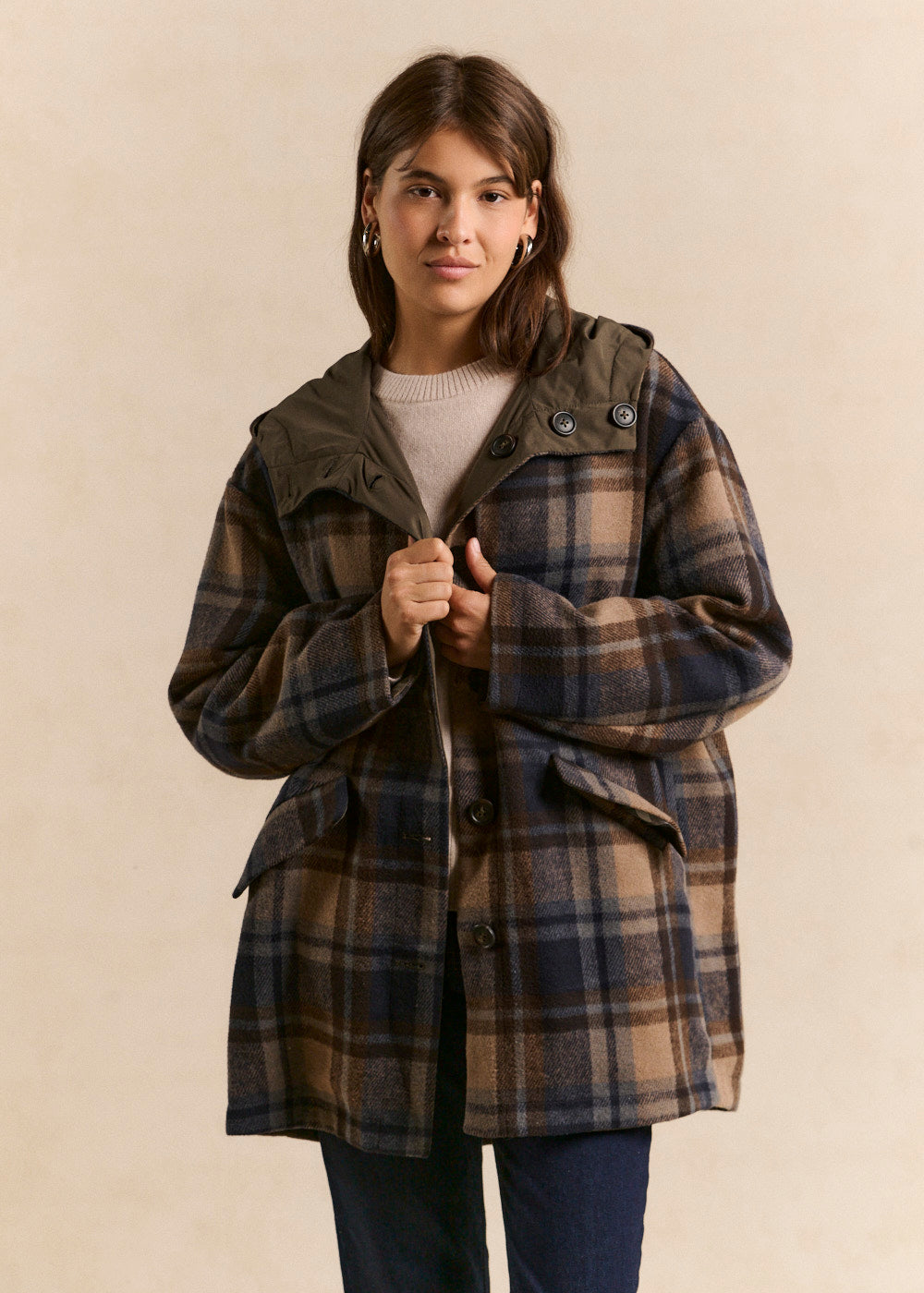 Plaid Parka with Olive Hood Over Cream Sweater and Dark Jeans — Parka Outfits
