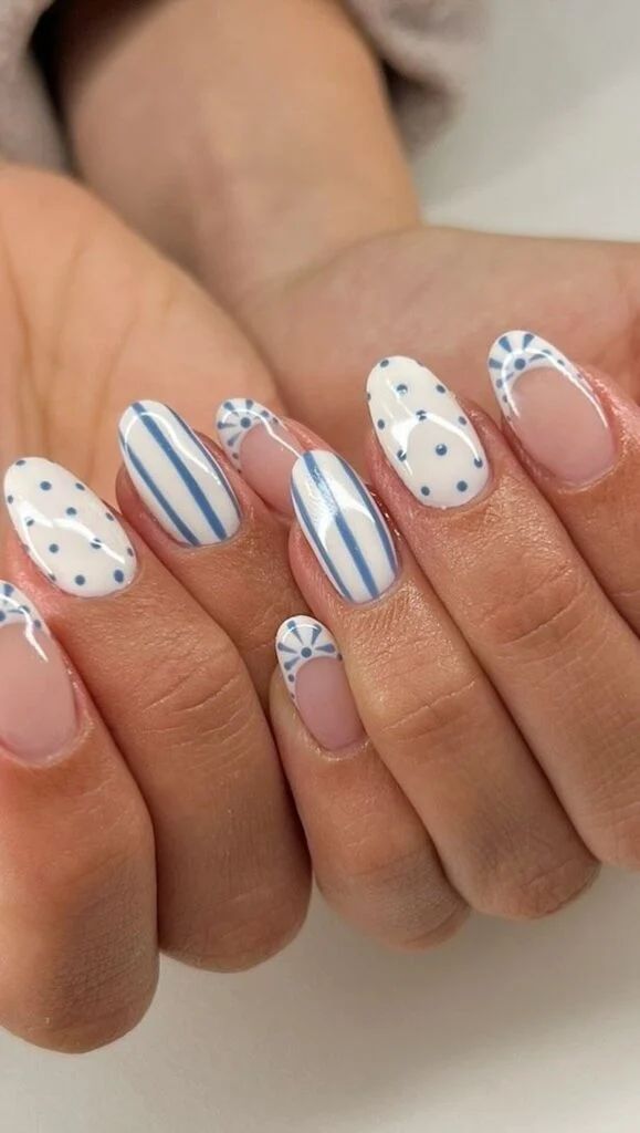 Sheer Nude with Navy Blue Accents Medium Oval — Holiday Nail Colors 2026
