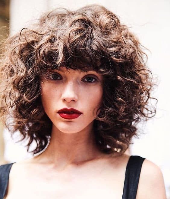 Chin-Length Bob With Curly Bangs — Winter Hairstyles for Curly Hair