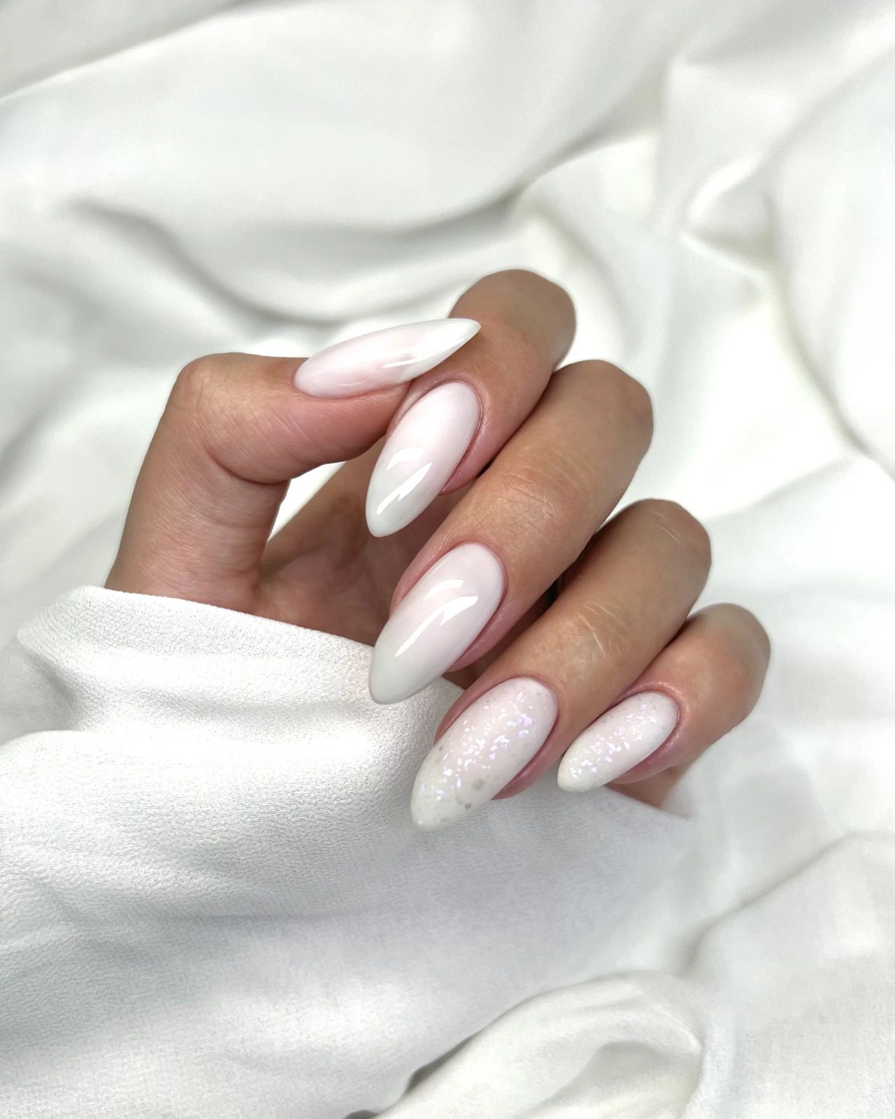 Milky White Almond Nails with Glitter Accents Milky White Almond Nails with Glitter Accents β Milky White Nails