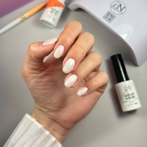 Off-White Pearlescent Shimmer Nails Off-White Pearlescent Shimmer Nails โ Winter Nail Colors for Women Over 40