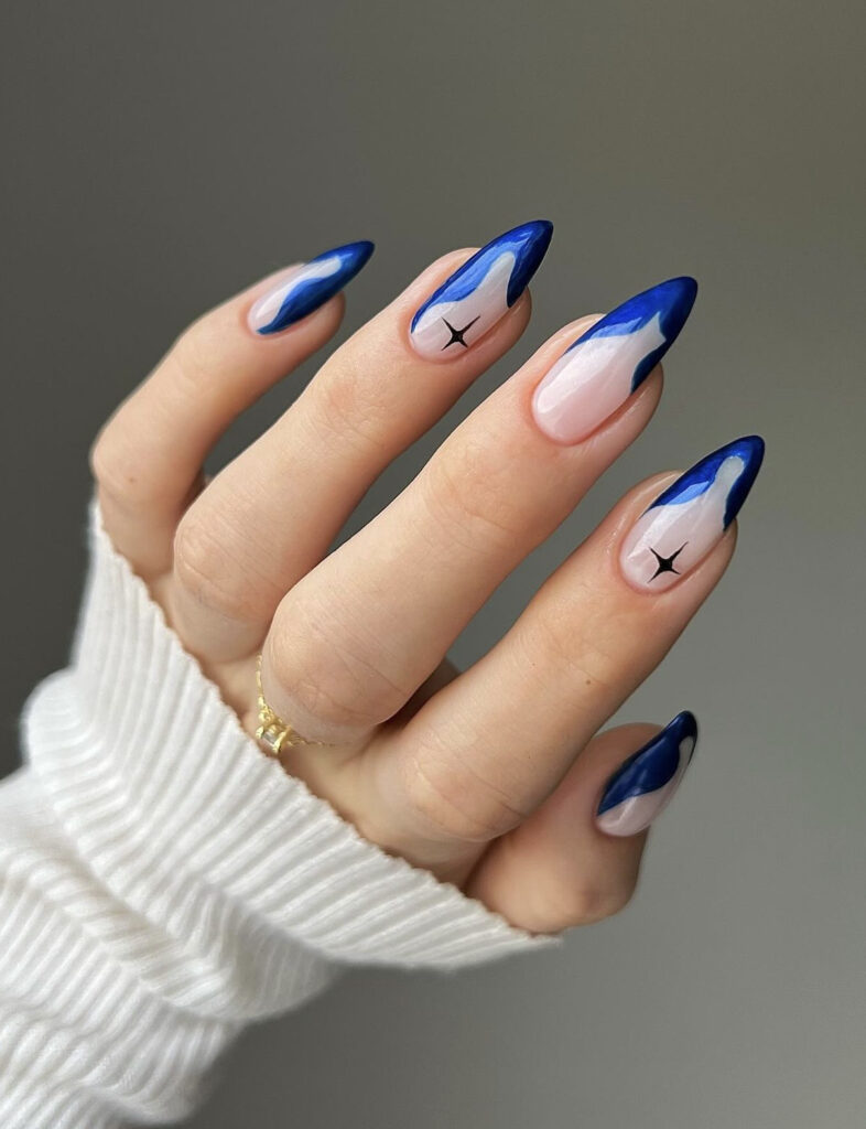 Sheer Nude with Abstract Blue Shapes Sheer Nude with Abstract Blue Shapes โ Winter Blue Nails