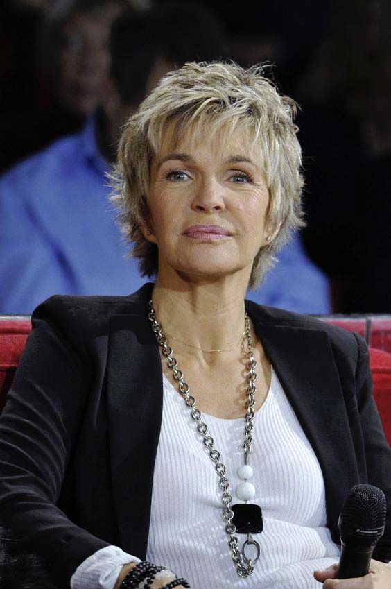 Chin-Length Ash Blonde Shag Chin-Length Ash Blonde Shag β Winter Hairstyles for Women Over 60