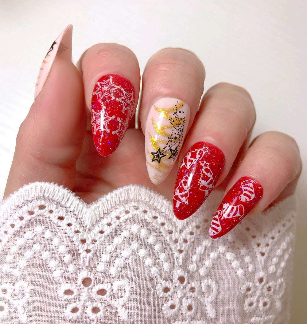 Deep Red Glitter Stilettos with Gold Snowflake Art Deep Red Glitter Stilettos with Gold Snowflake Art β Red Christmas Nails 2026
