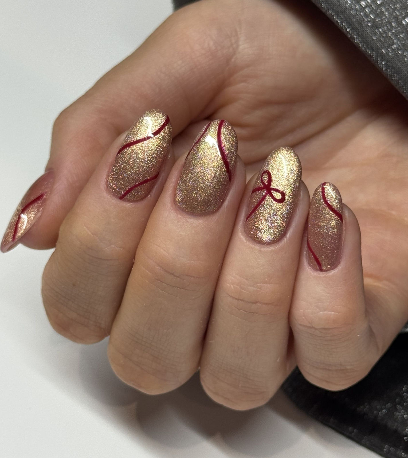 Gold Glitter Red Swirl Oval Nails Gold Glitter Red Swirl Oval Nails β New Years Nail Designs 2027