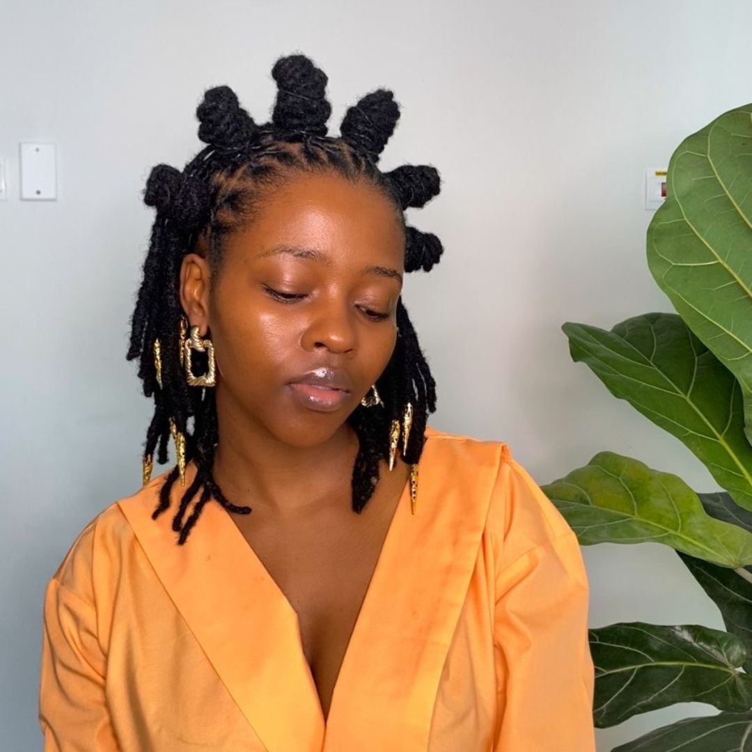 Playful Space Buns With Hanging Locs Playful Space Buns With Hanging Locs β Winter Loc Styles