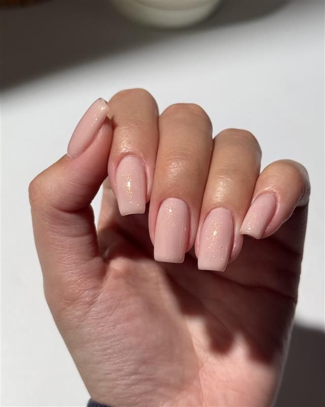 Subtle Glitter Accents On All Nails Pale Pink Gold Shimmer Glossy Medium Square Nails — Winter Nail Colors for Pale Skin