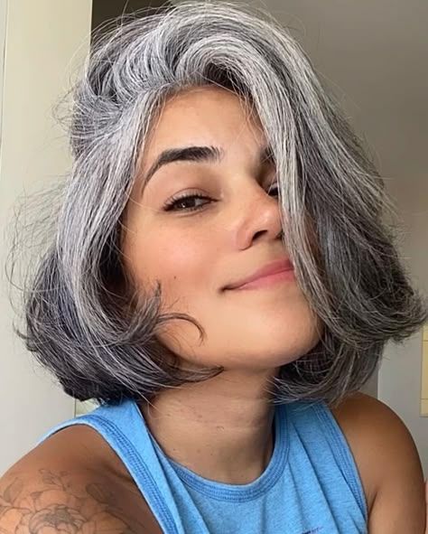 Thick Wavy Bob With Natural Gray Tones Thick Wavy Bob With Natural Gray Tones β Gray Blending Highlights