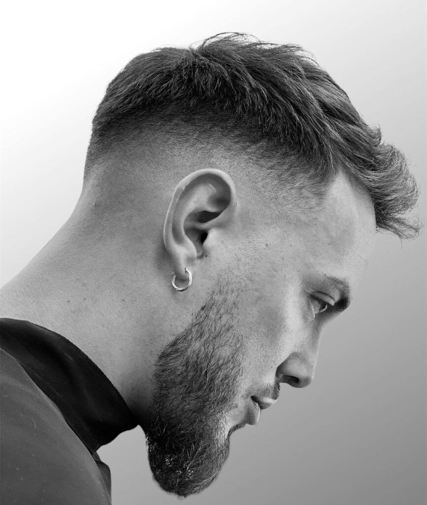 Short Textured Sweep Back with Undercut Fade — Winter Haircuts for Men