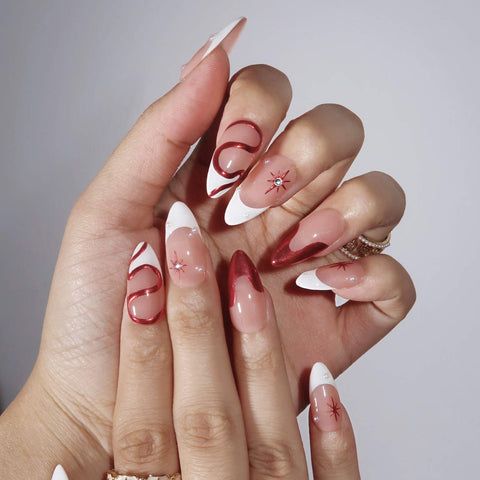 Long Coffin Nails with Red Glitter Swirls Long Coffin Nails with Red Glitter Swirls β Red Christmas Nails 2026