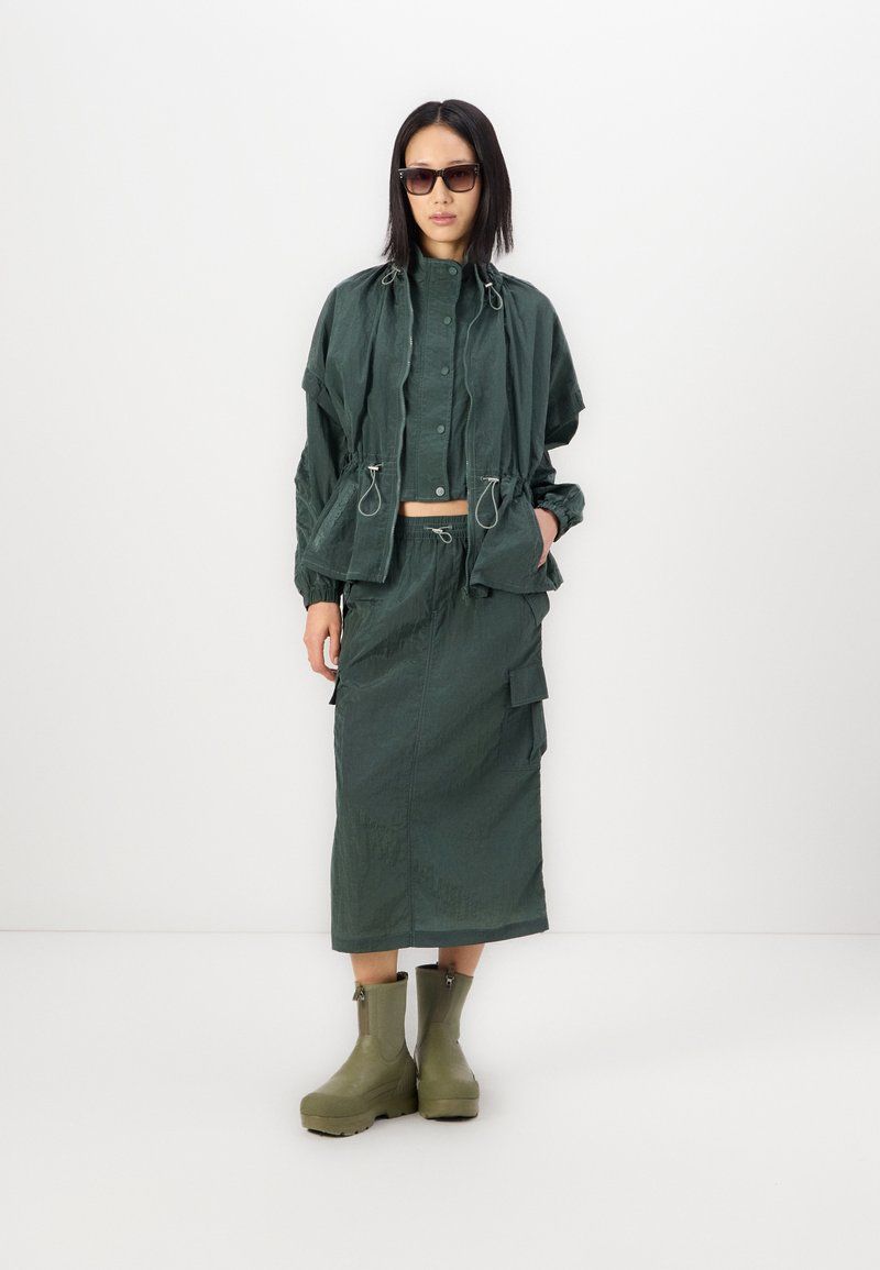 Monochromatic Green Cargo Outfit with Olive Boots — Ugg Boots Outfits