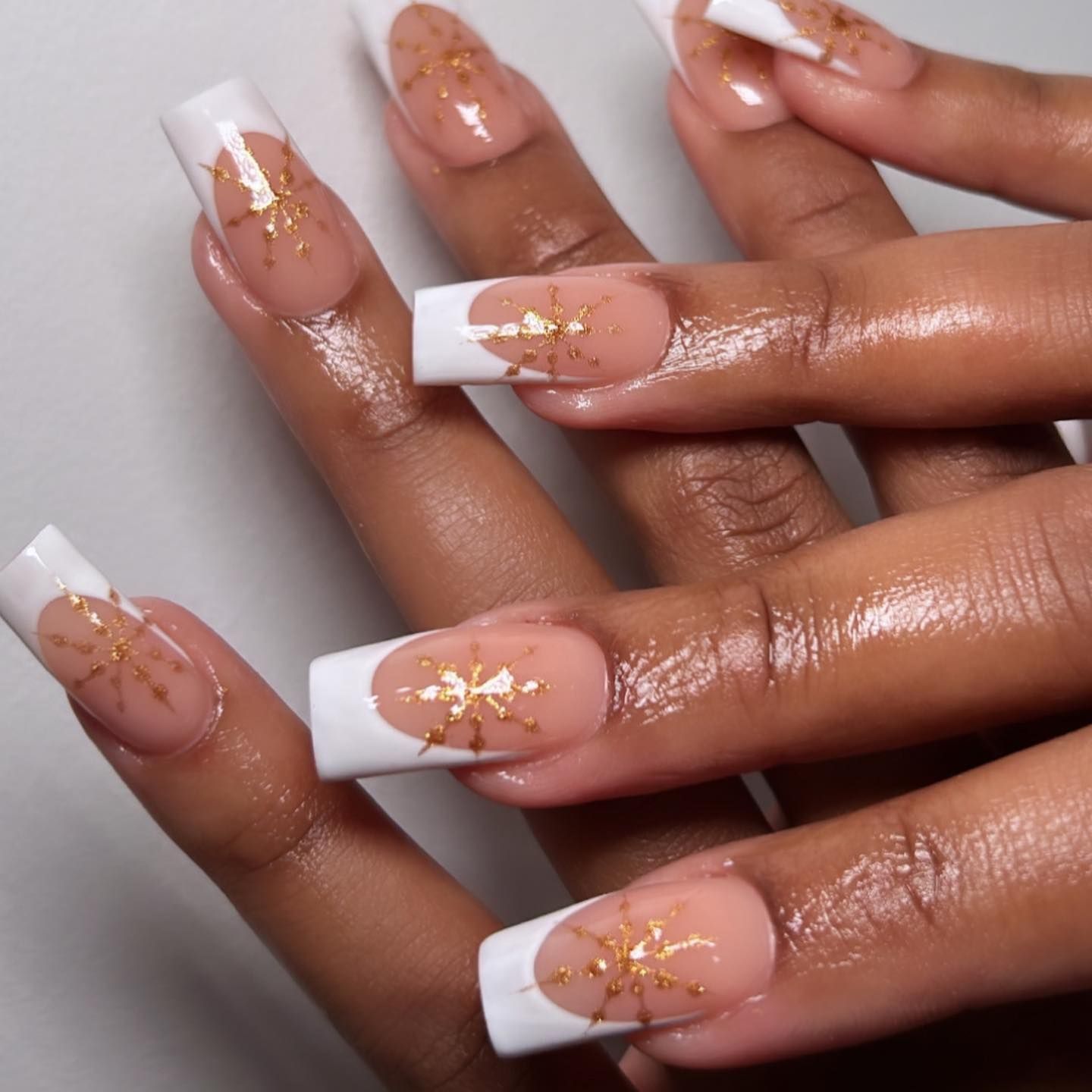 French Tips with Gold Snowflakes French Tips with Gold Snowflakes β Winter Square Nails