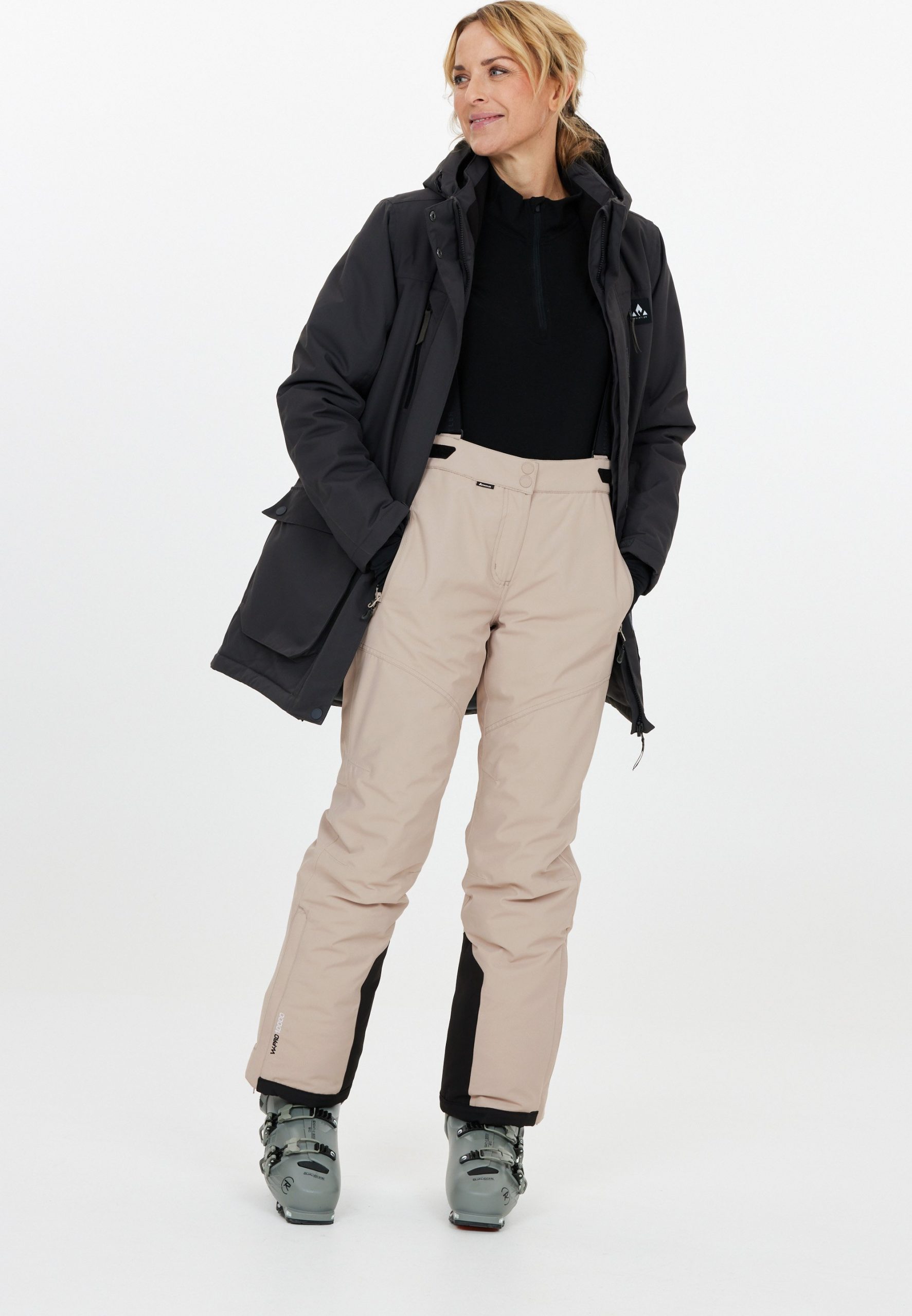 Sophisticated Dark Grey Parka with Beige Ski Pants Sophisticated Dark Grey Parka with Beige Ski Pants β Ski Outfits