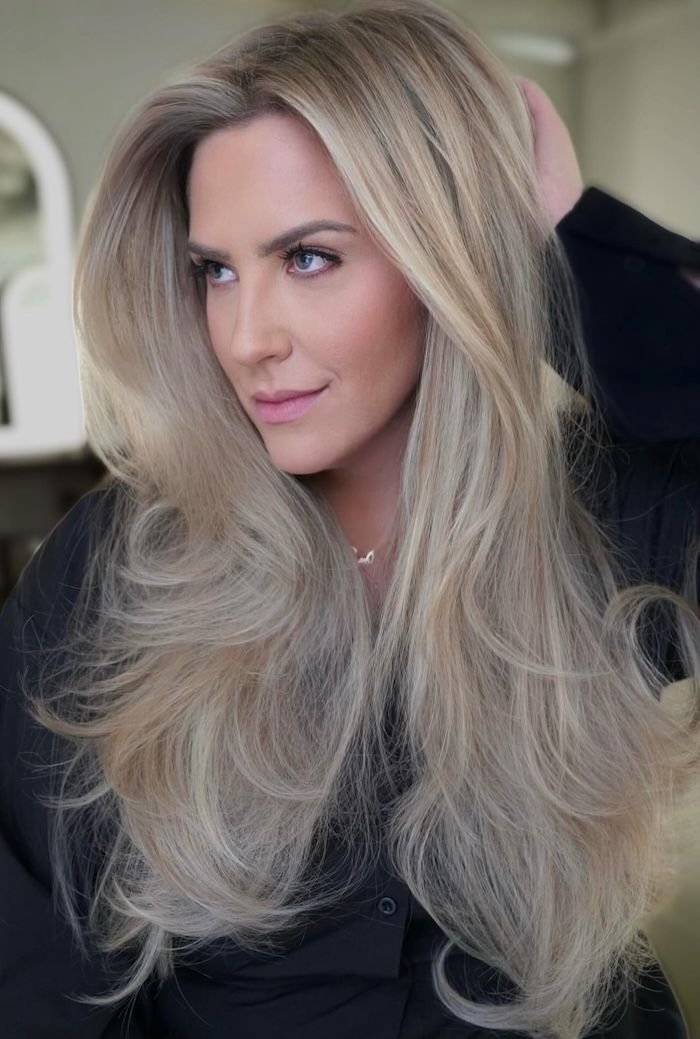 Voluminous Long Layers With Curls Voluminous Long Layers With Curls β Winter Haircuts for Heart Shaped Faces