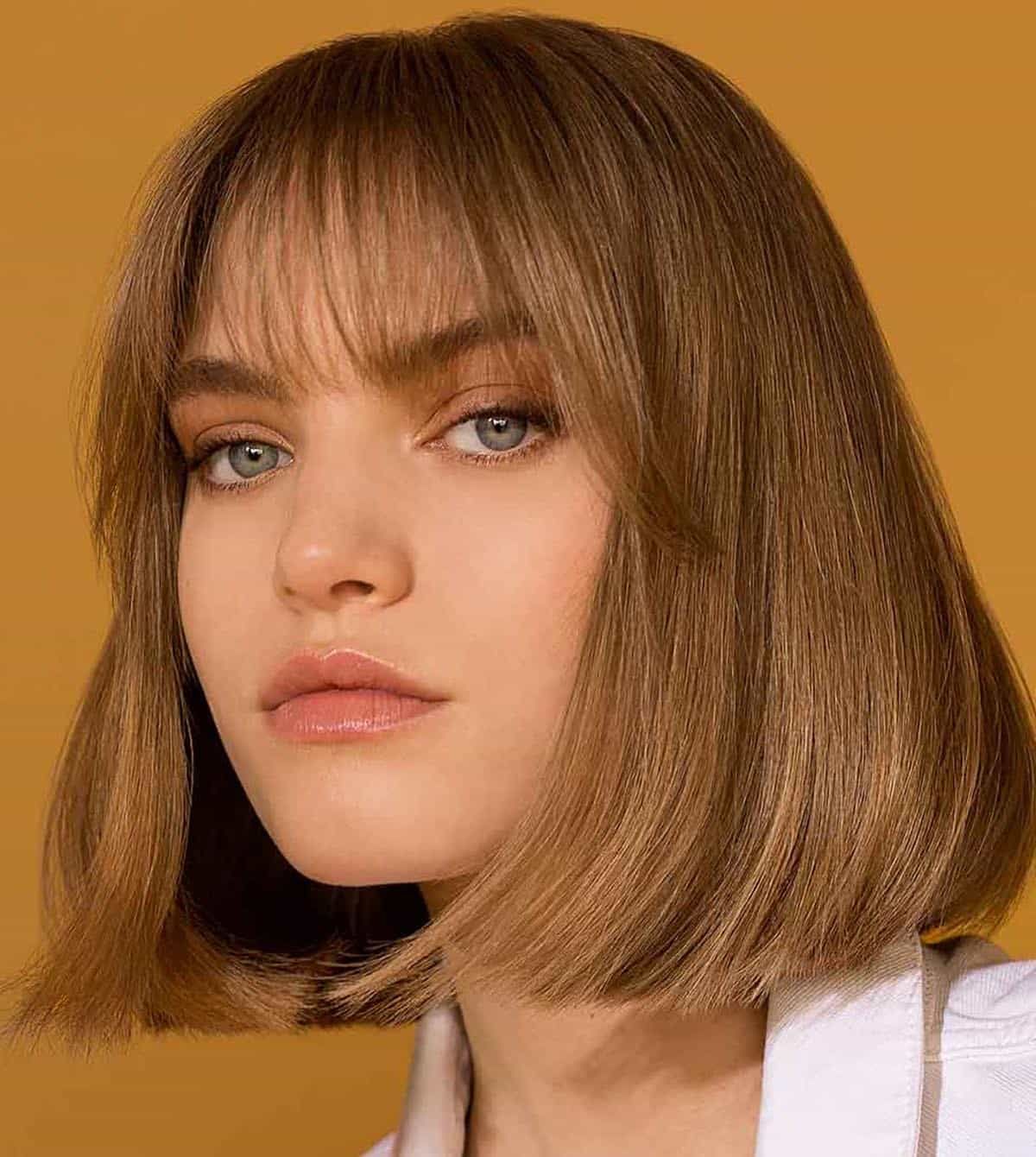 Sharp Medium Brown Blunt Bob — Winter Haircuts for Straight Hair