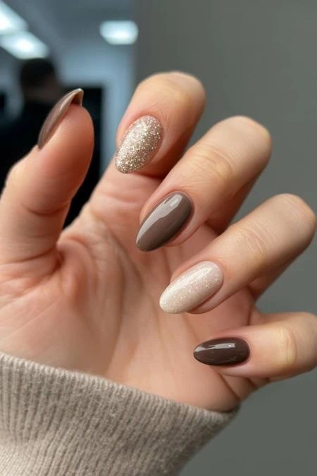 Glitter Accent On Accent Nail Visual Idea — Winter Nude Nails