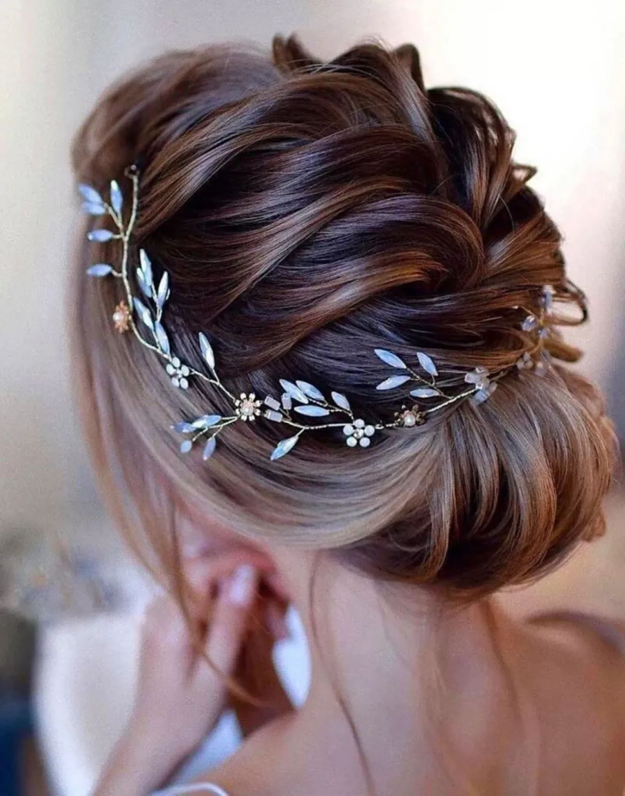 Dark Brown Twisted Updo With Vine Accessory Dark Brown Twisted Updo With Vine Accessory β Winter Formal Hairstyles