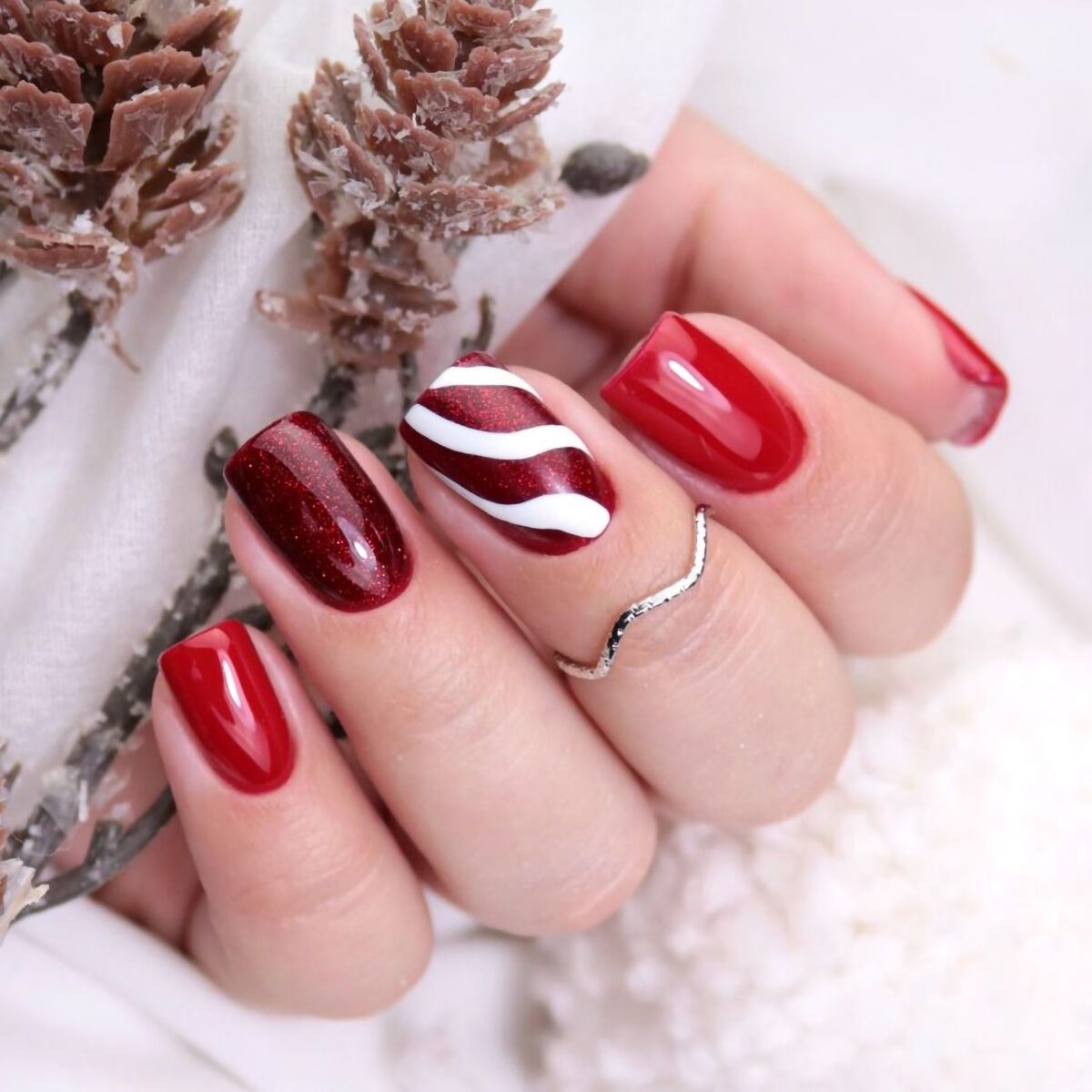 Deep Red with Candy Cane Accent — Christmas Nail Designs 2026