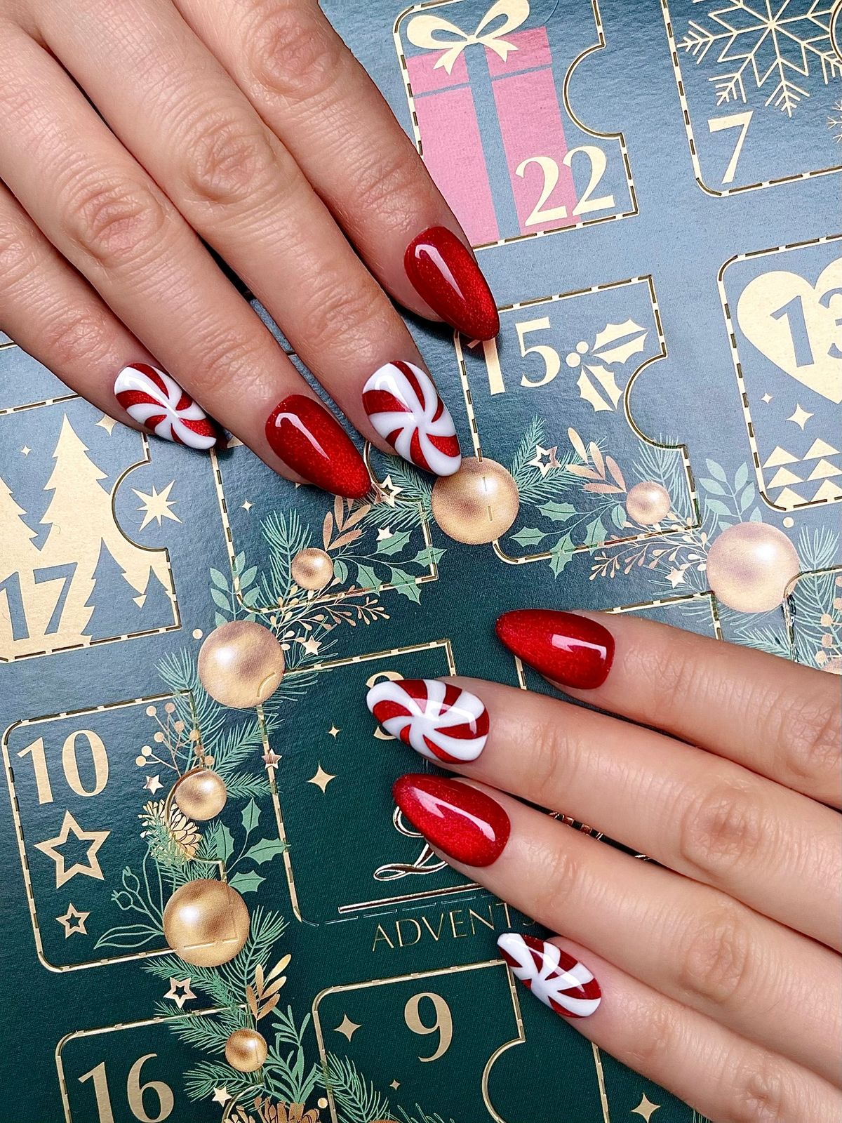 Candy Cane Stripes And Glitter Accents Visual Idea Candy Cane Stripes And Glitter Accents Visual Idea โ Winter Almond Nails