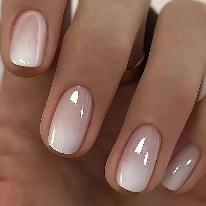 Nude to White Glossy Ombre Nails Nude to White Glossy Ombre Nails β Short Winter Gel Nails