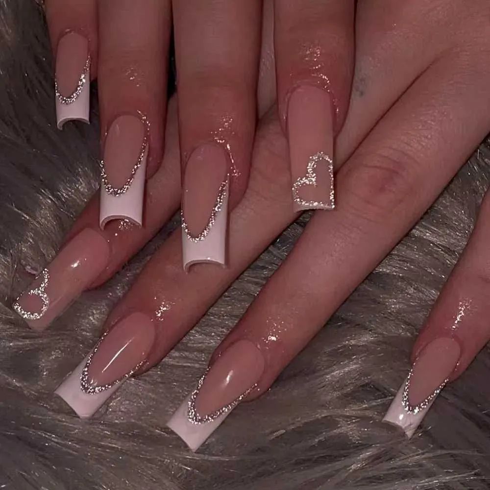Nude Glitter French Tip Heart Coffin Nails Nude Glitter French Tip Heart Coffin Nails β New Years Coffin Nails 2027