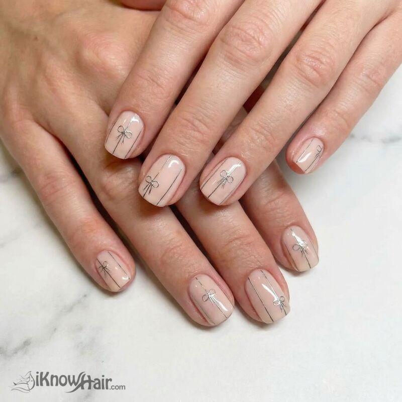 Pale Nude with Delicate Silver Bows — Winter Nude Nails