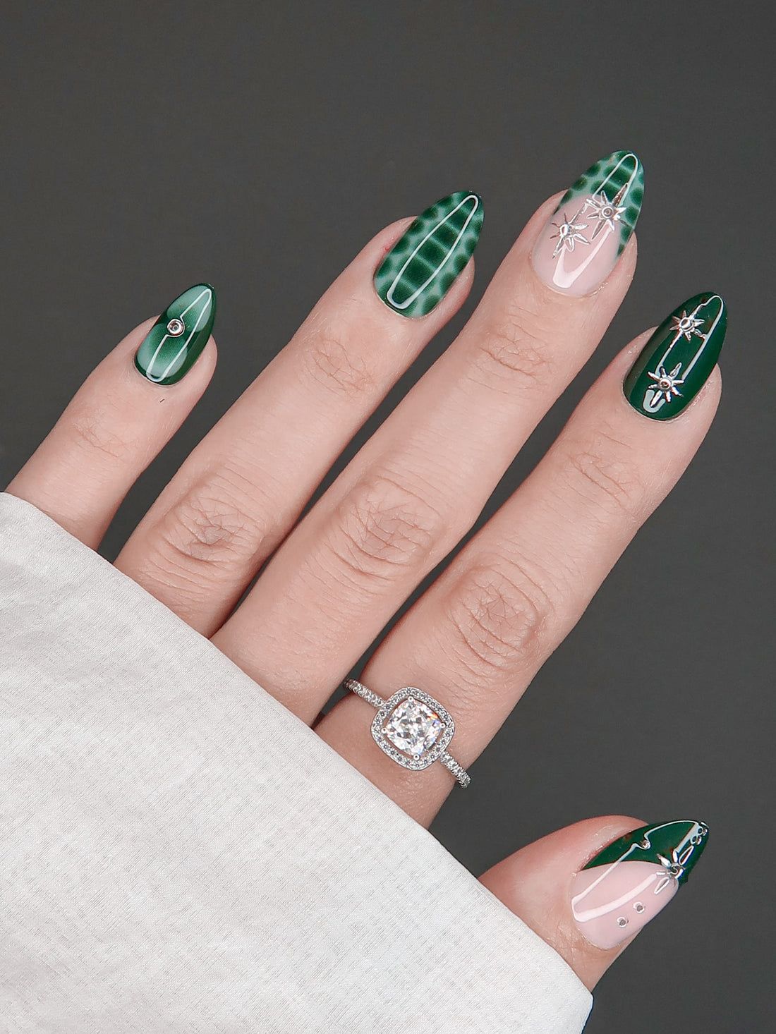 Deep Green Star Accent Almond Nails — New Years Almond Nails 2027
