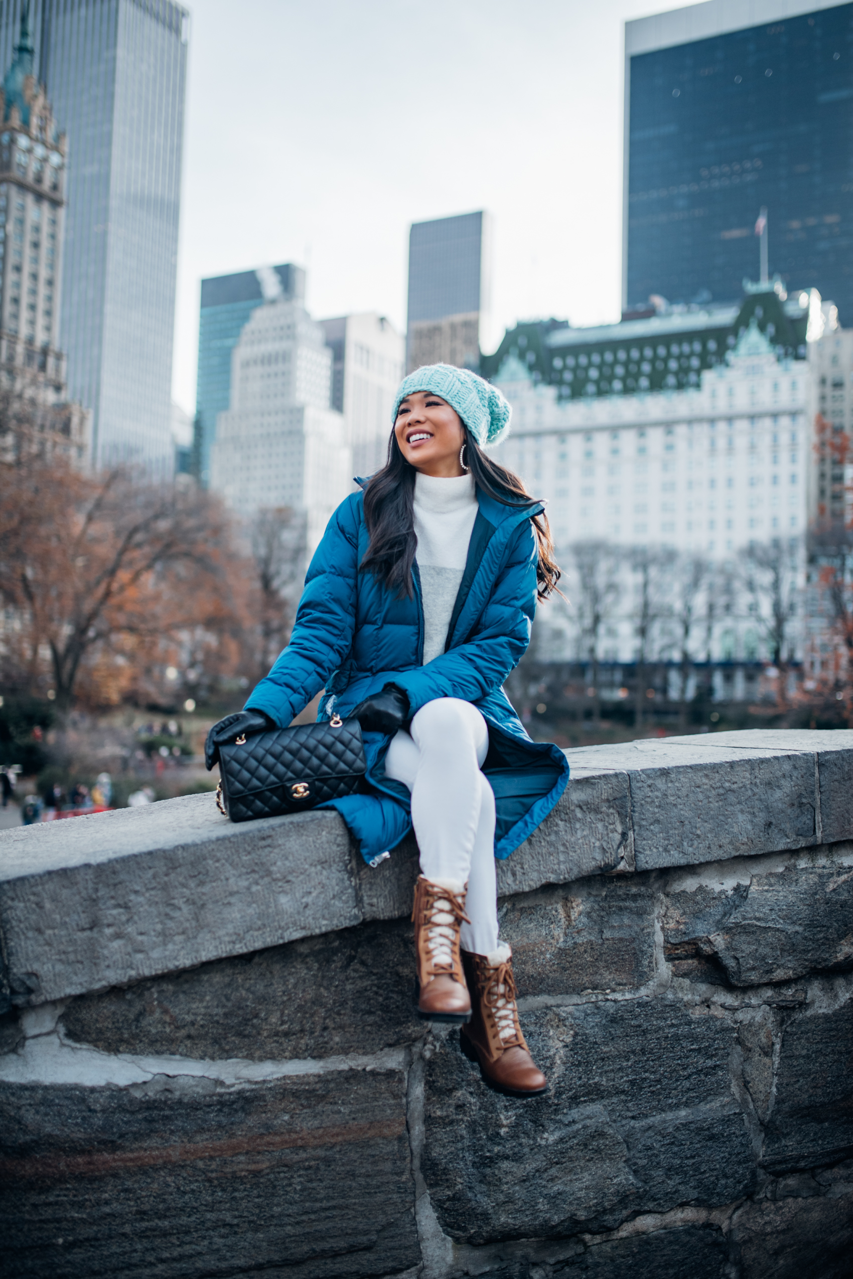 Bright Blue Puffer Jacket with White Jeans for Winter Fun — January Outfits