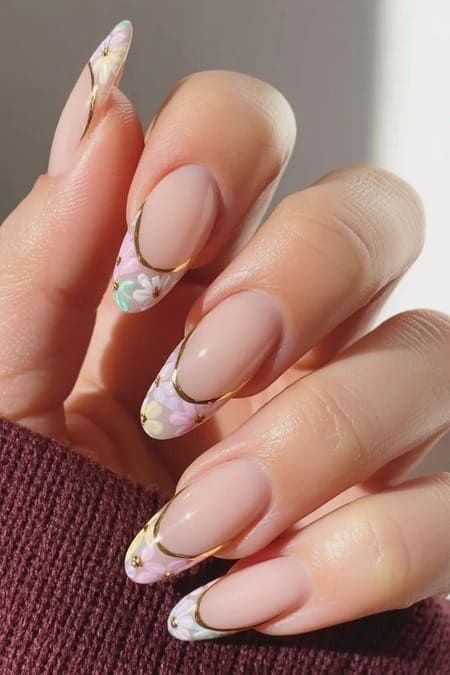 Nude Base French with Pastel Floral Accents Nude Base French with Pastel Floral Accents β Winter to Spring Transition Nails
