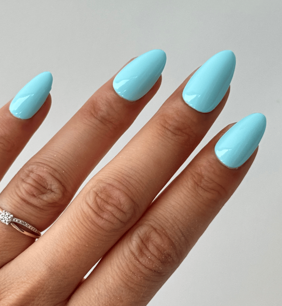 Bright Solid Blue Glossy Medium Almond Nails Bright Solid Blue Glossy Medium Almond Nails β Icy Blue Nails