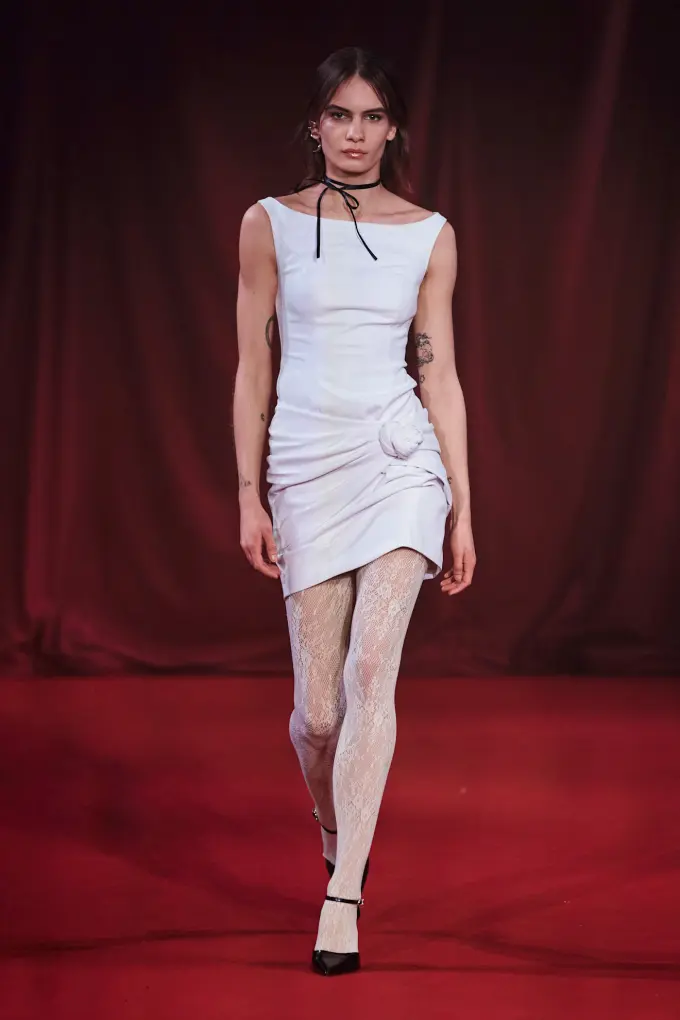 Intricate White Lace Tights Elevating a White Mini Dress Intricate White Lace Tights Elevating a White Mini Dress β Tights Outfits