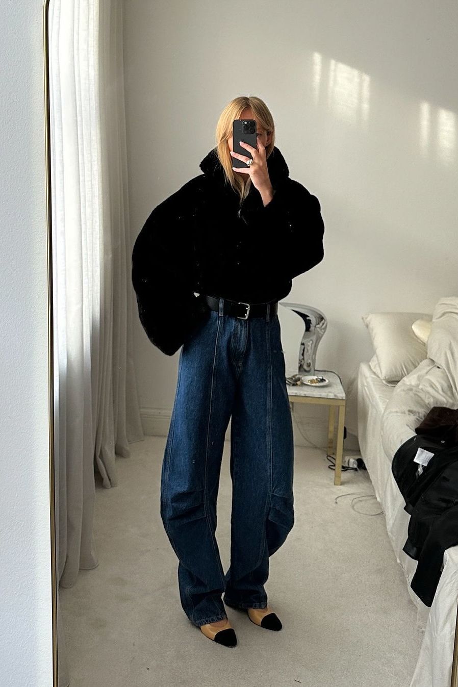 Textural Contrast: Faux Fur Jacket with Black Top and Dark Wash Wide Leg Jeans — Winter Outfits with Wide Leg Jeans
