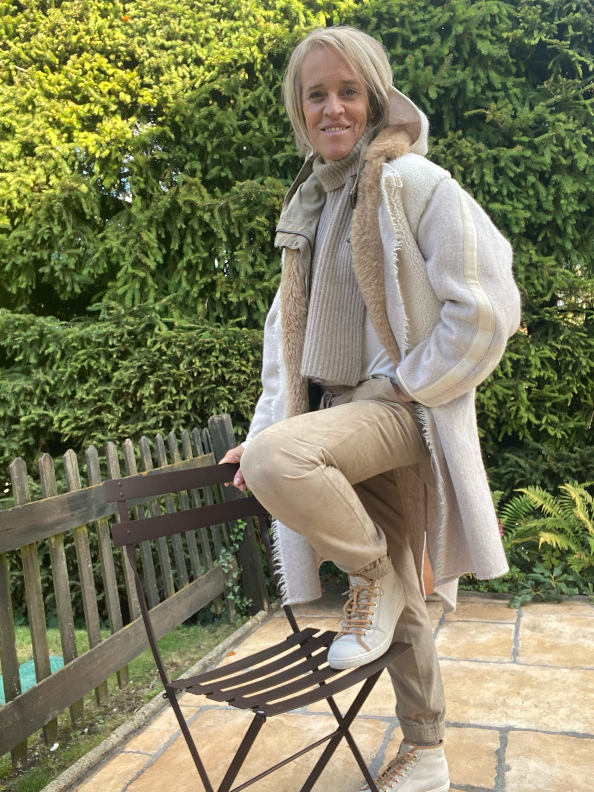 Cozy Neutrals: Shearling Coat Over Utility Jacket — Winter Layering Outfits