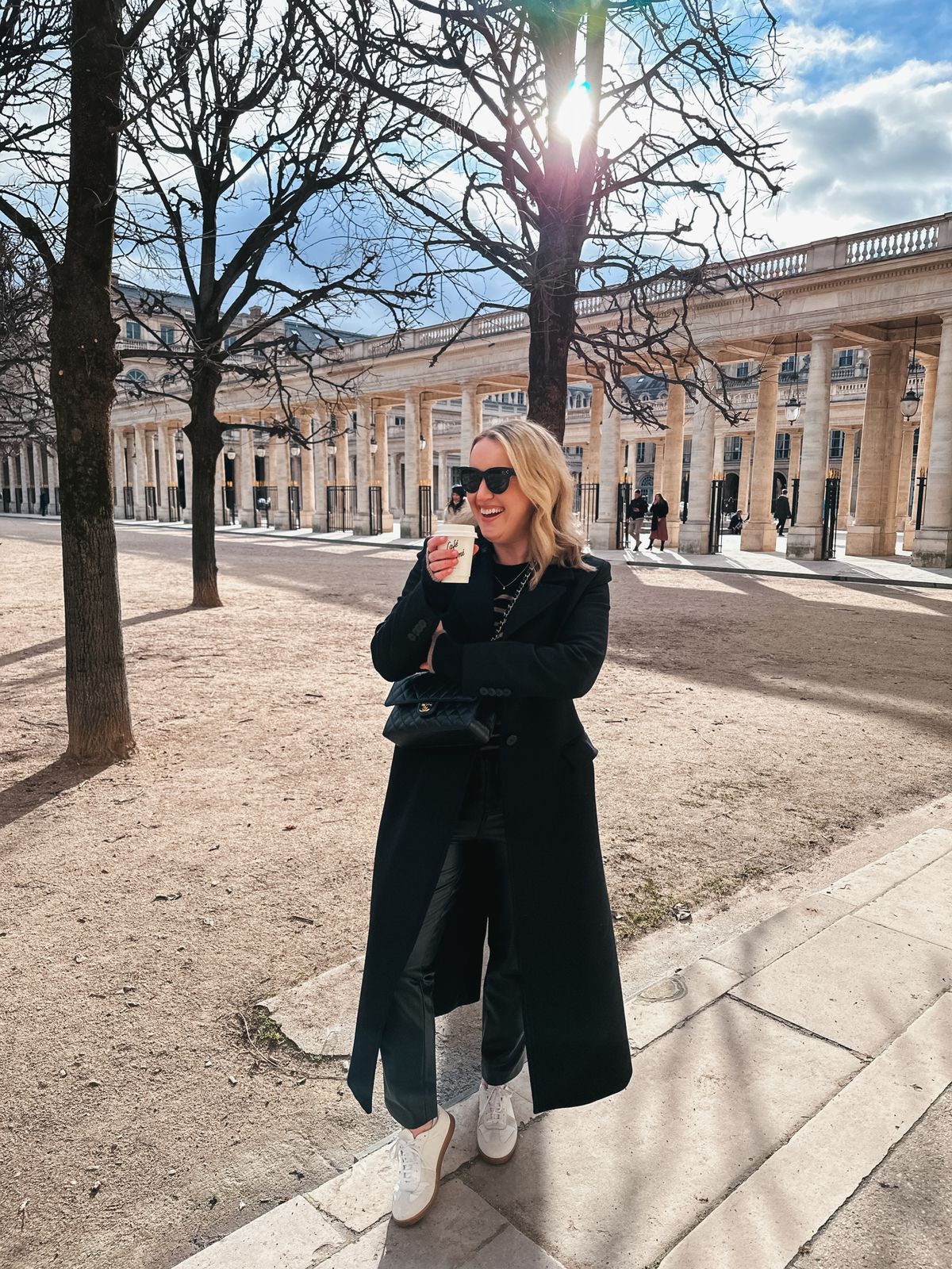 Classic Black Coat and Sneakers for Urban Comfort — February Outfits
