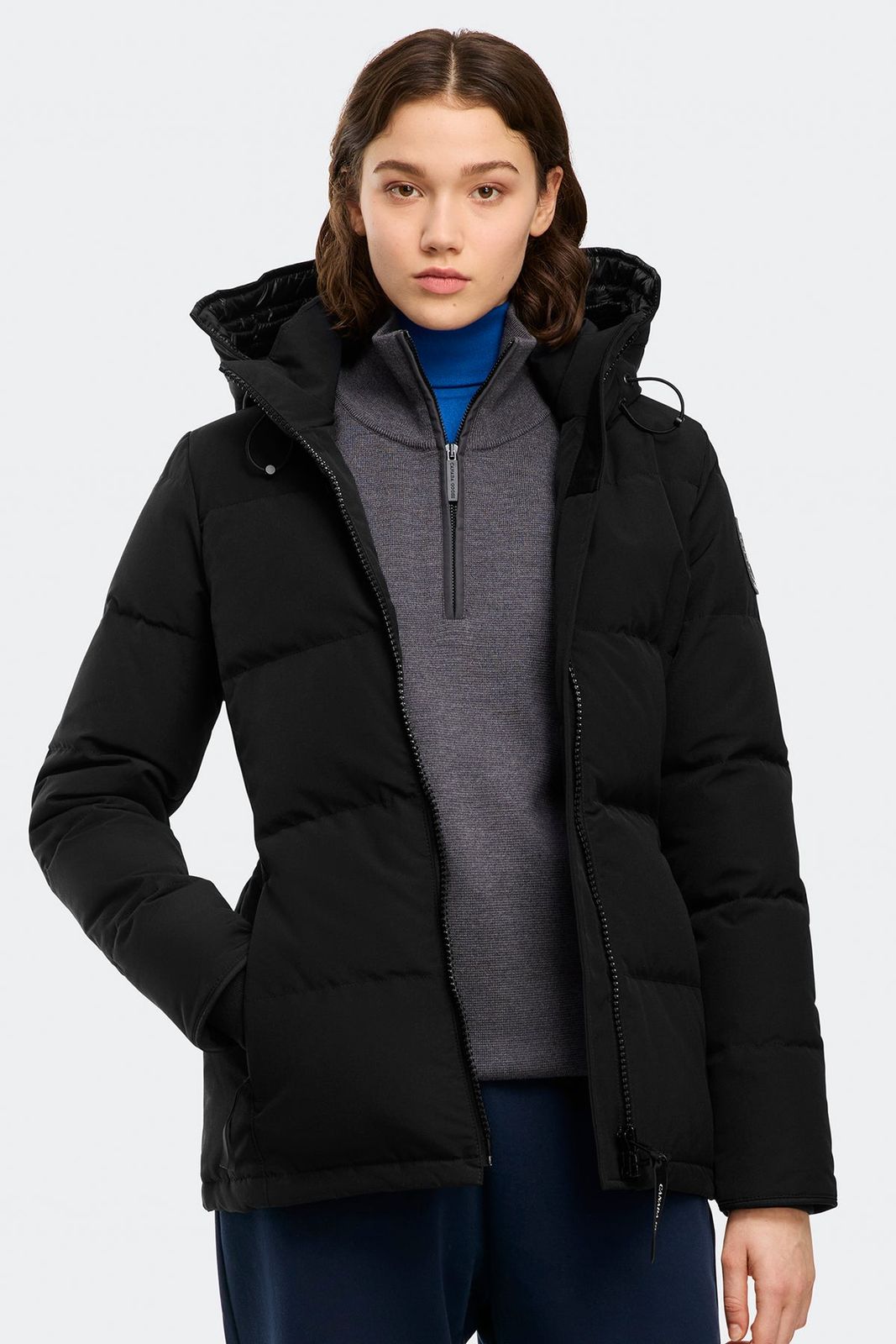 Black Puffer Jacket Layered Over Quarter-Zip Sweater — Winter Jackets for Women
