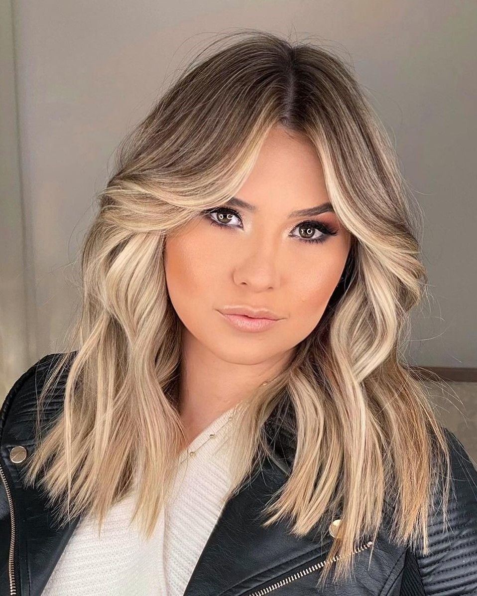 Visual Idea — A Shoulder-Length Haircut Featuring Long — Winter Haircuts for Round Faces