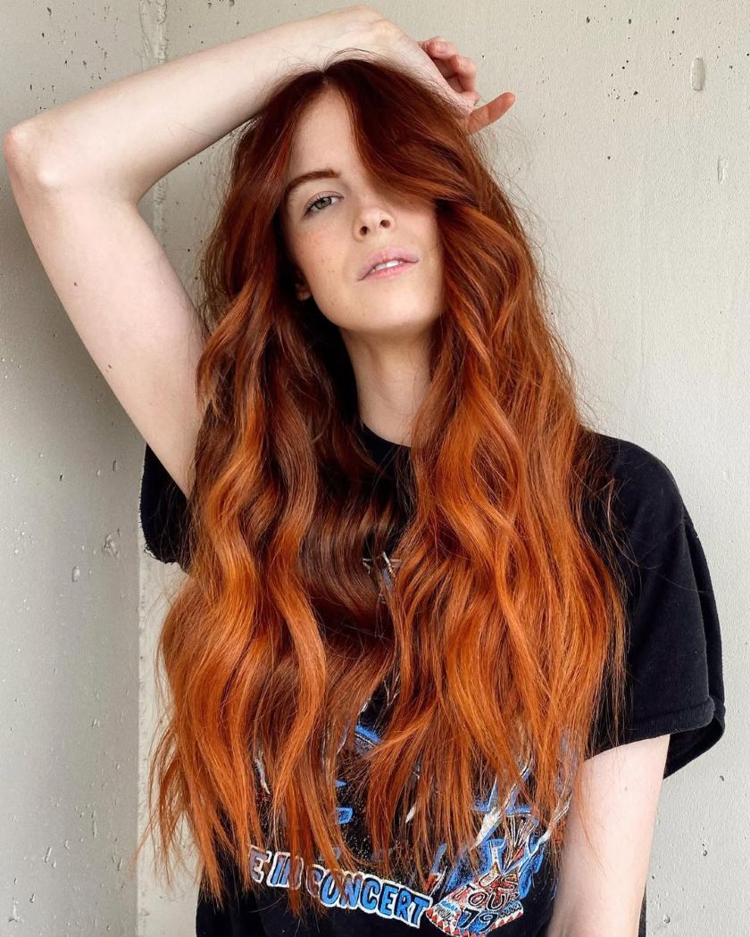 Vibrant Copper Orange With Curtain Bangs — Winter Hair Colors for Redheads