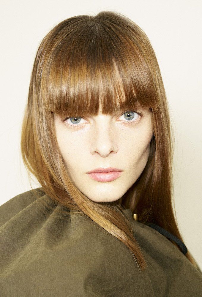 Mid-Back Visual Idea — Winter Haircuts with Bangs