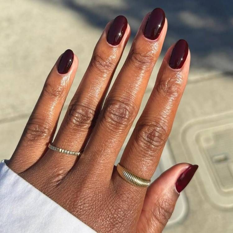High Gloss Cool Burgundy Oval Nails High Gloss Cool Burgundy Oval Nails β Winter Nail Colors for Dark Skin