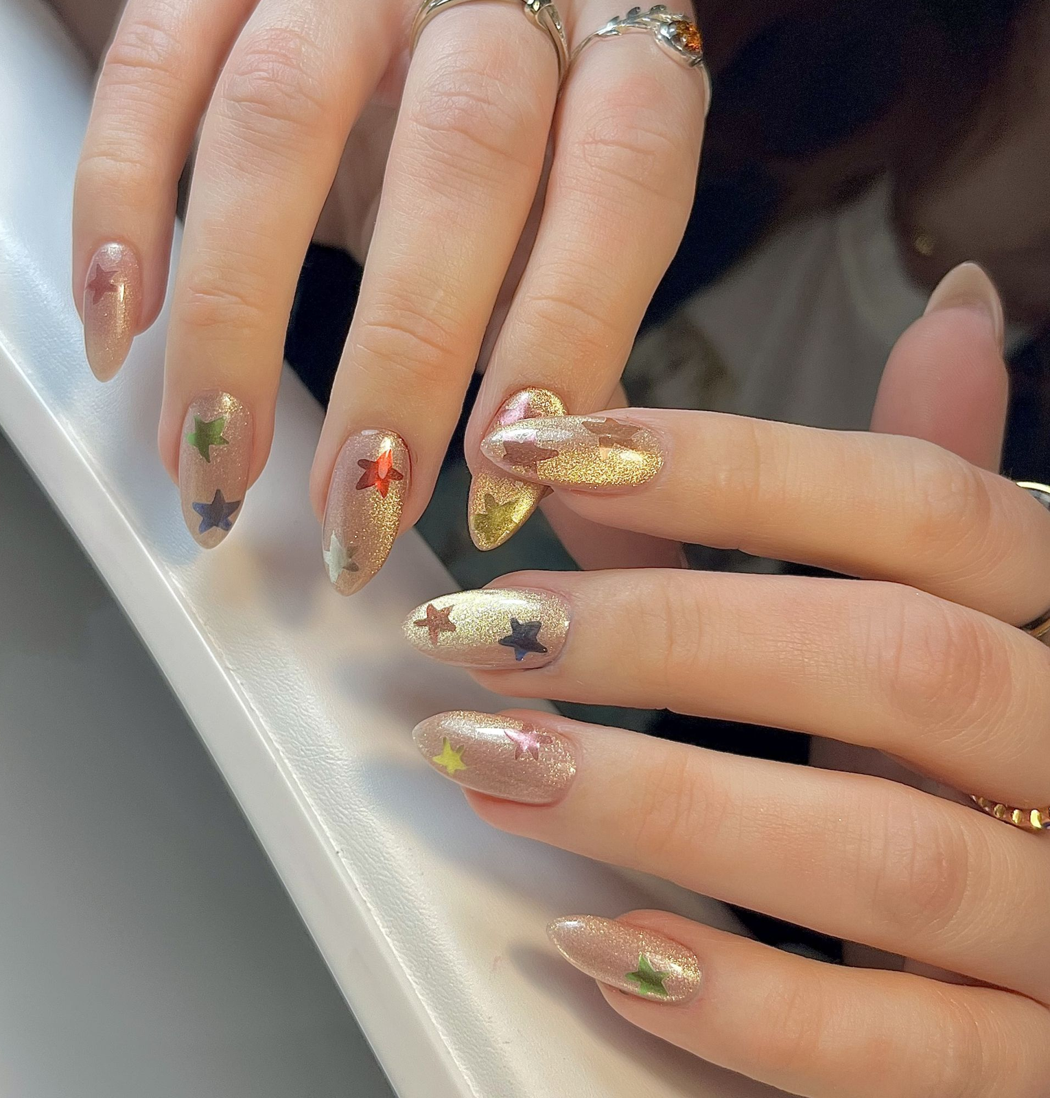Champagne Gold Star Decal Almond Nails Champagne Gold Star Decal Almond Nails β New Years Nail Designs 2027